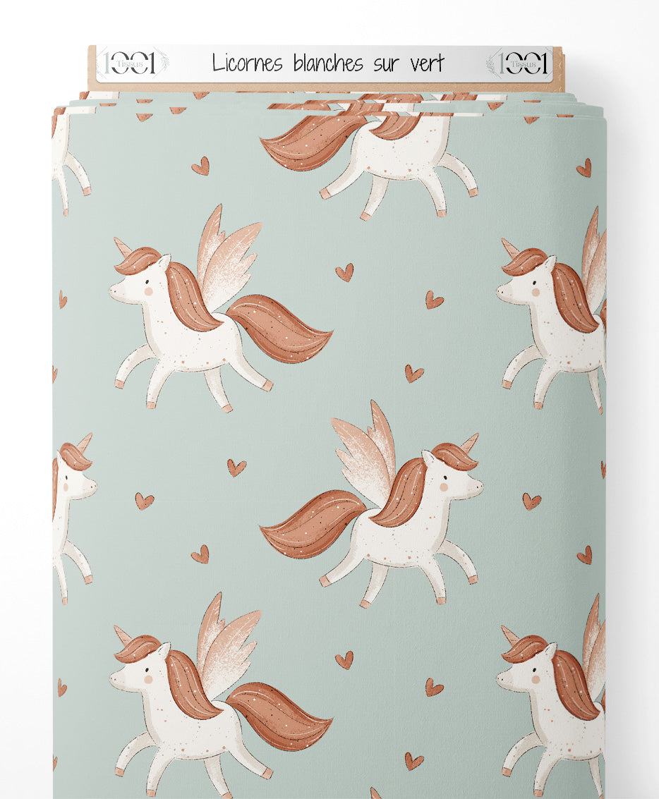 Tissu - Licornes blanches sur vert