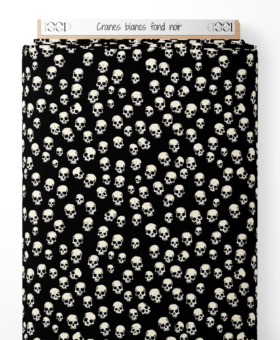 Tissu - Crânes blancs sur fond noir