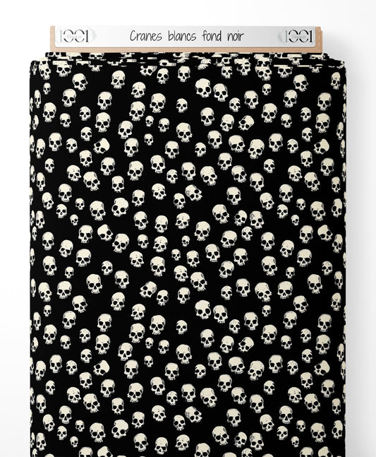 Tissu - Crânes blancs sur fond noir
