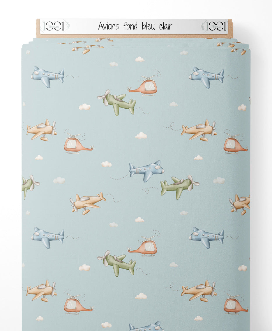 Tissu - Avions sur fond bleu clair