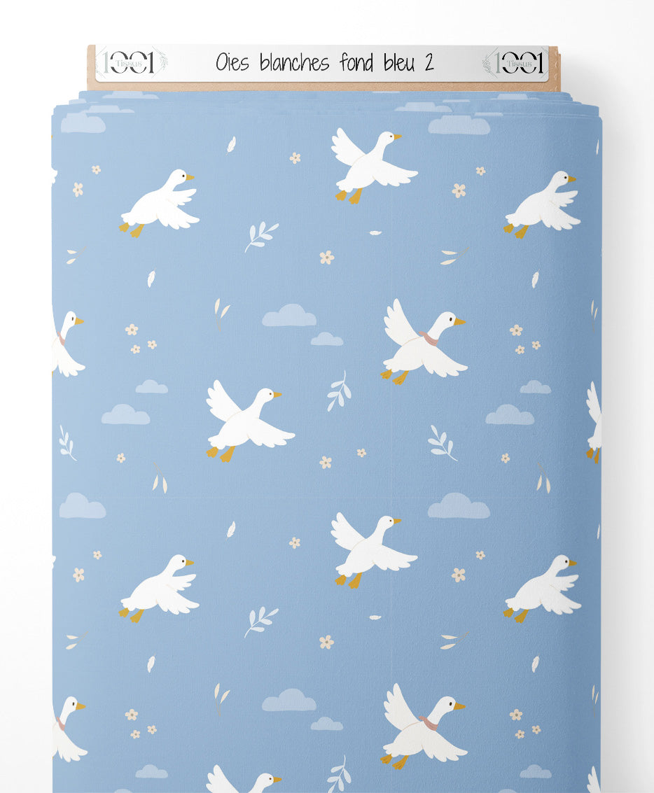 Tissu - Oies blanches sur fond bleu 2