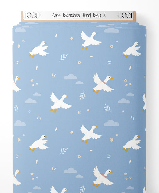 Tissu - Oies blanches sur fond bleu 2