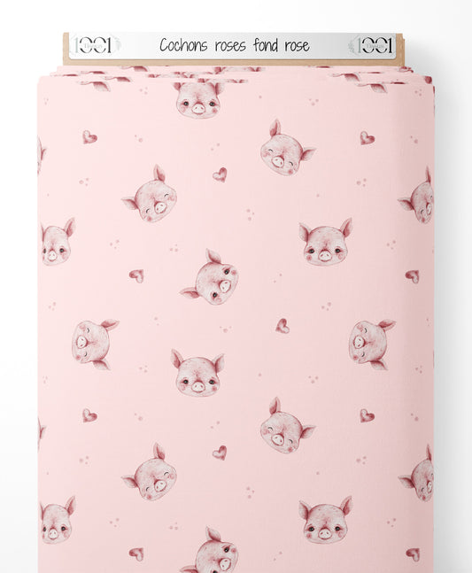Tissu - Cochons roses sur fond rose