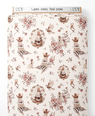 Tissu - Lapins nobles sur fond crème