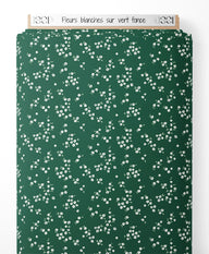 Tissu - Fleurs blanches sur vert foncé