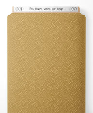 Tissu - Pois blancs variés sur beige