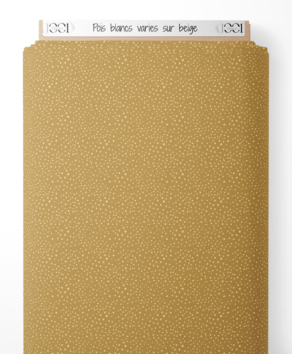 Tissu - Pois blancs variés sur beige