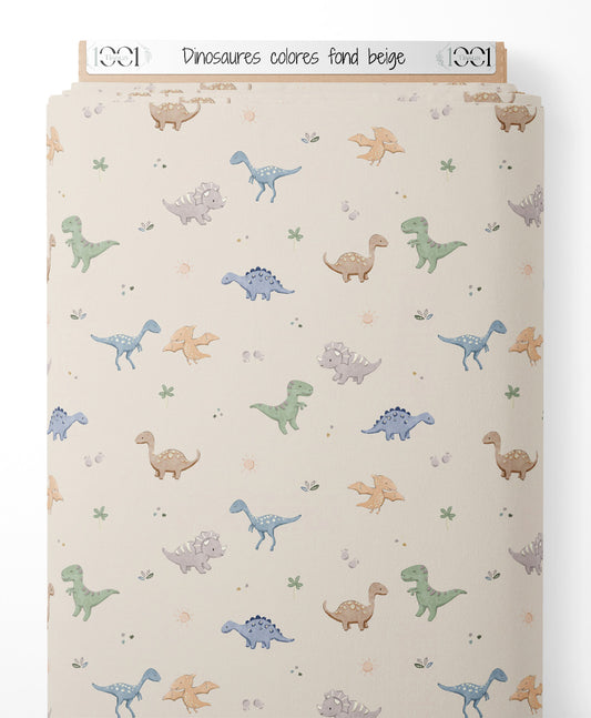 Tissu - Dinosaures colorés sur fond beige