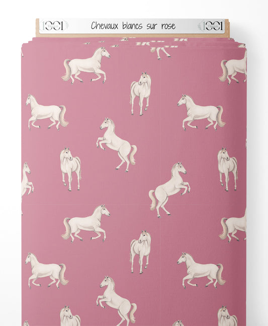 Tissu - Chevaux blancs sur rose