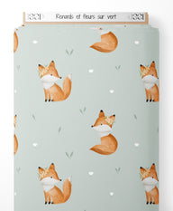 Tissu - Renards et fleurs sur vert