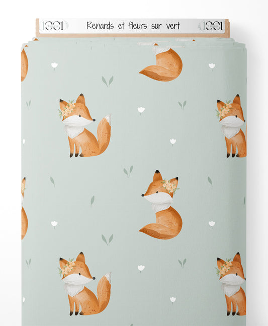 Tissu - Renards et fleurs sur vert