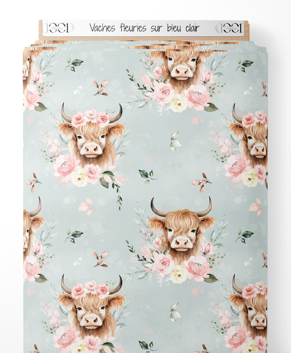 Tissu - Vaches fleuries sur bleu clair