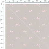 Tissu - Nœuds roses sur fond beige 2