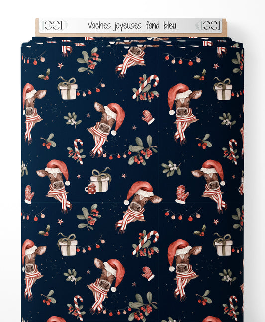 Tissu - Vaches joyeuses sur fond bleu