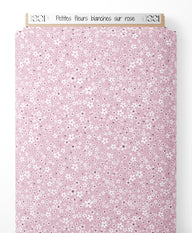 Tissu - Petites fleurs blanches sur rose