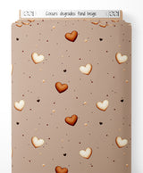 Tissu - Cœurs dégradés sur fond beige
