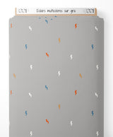 Tissu - Éclairs multicolores sur gris