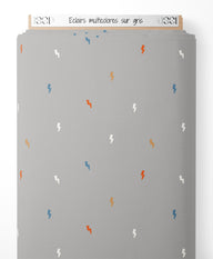 Tissu - Éclairs multicolores sur gris