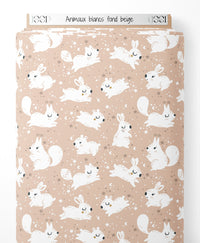 Tissu - Animaux blancs sur fond beige