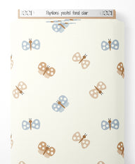 Tissu - Papillons pastel sur fond clair