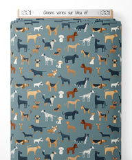 Tissu - Chiens variés sur bleu vif