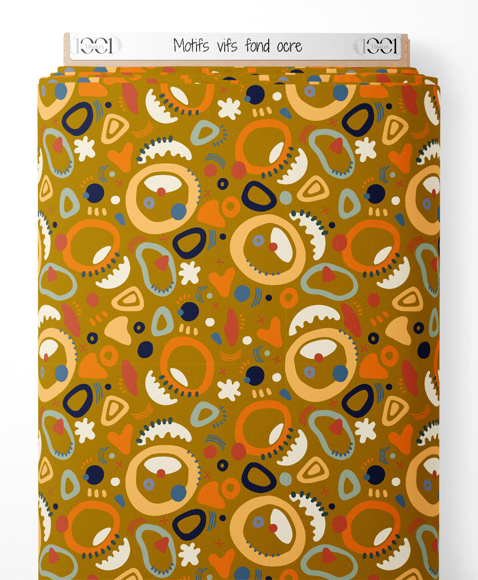 Tissu - Motifs vifs sur fond ocre