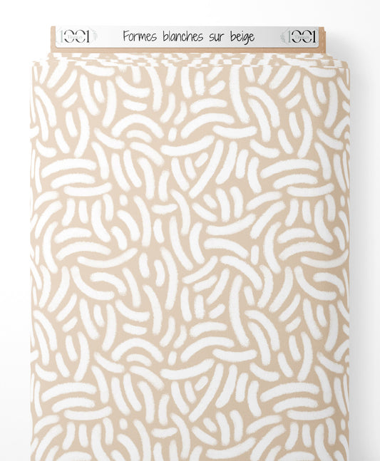 Tissu - Formes blanches sur beige