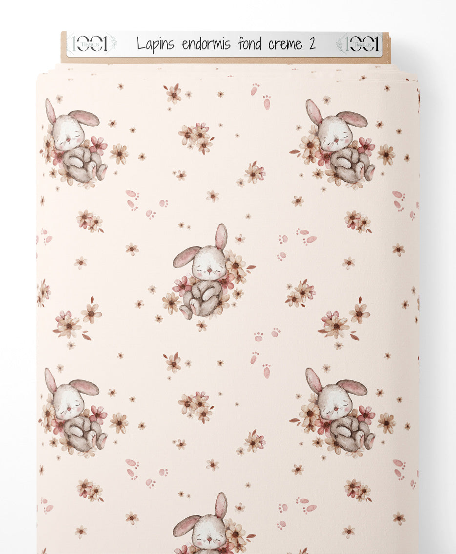Tissu - Lapins endormis sur fond crème 2