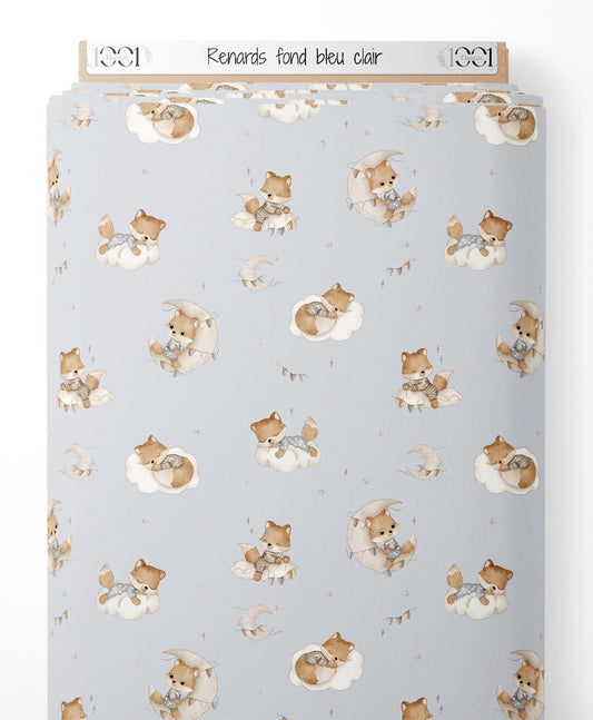 Tissu - Renards sur fond bleu clair