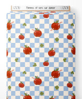 Tissu - Pommes et vers sur damier