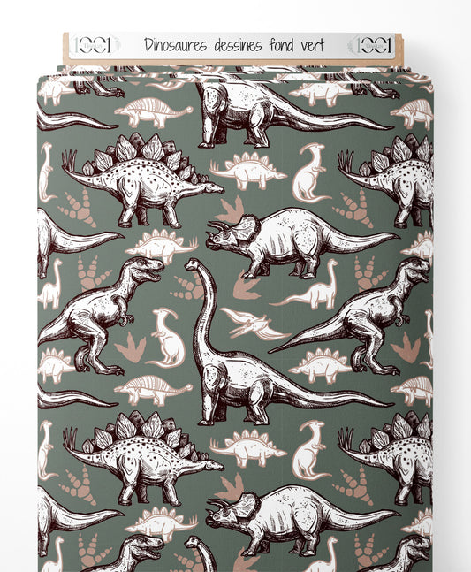 Tissu - Dinosaures dessinés sur fond vert