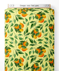 Tissu - Oranges vives sur fond jaune