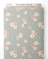 Tissu - Fleurs blanches sur fond vert