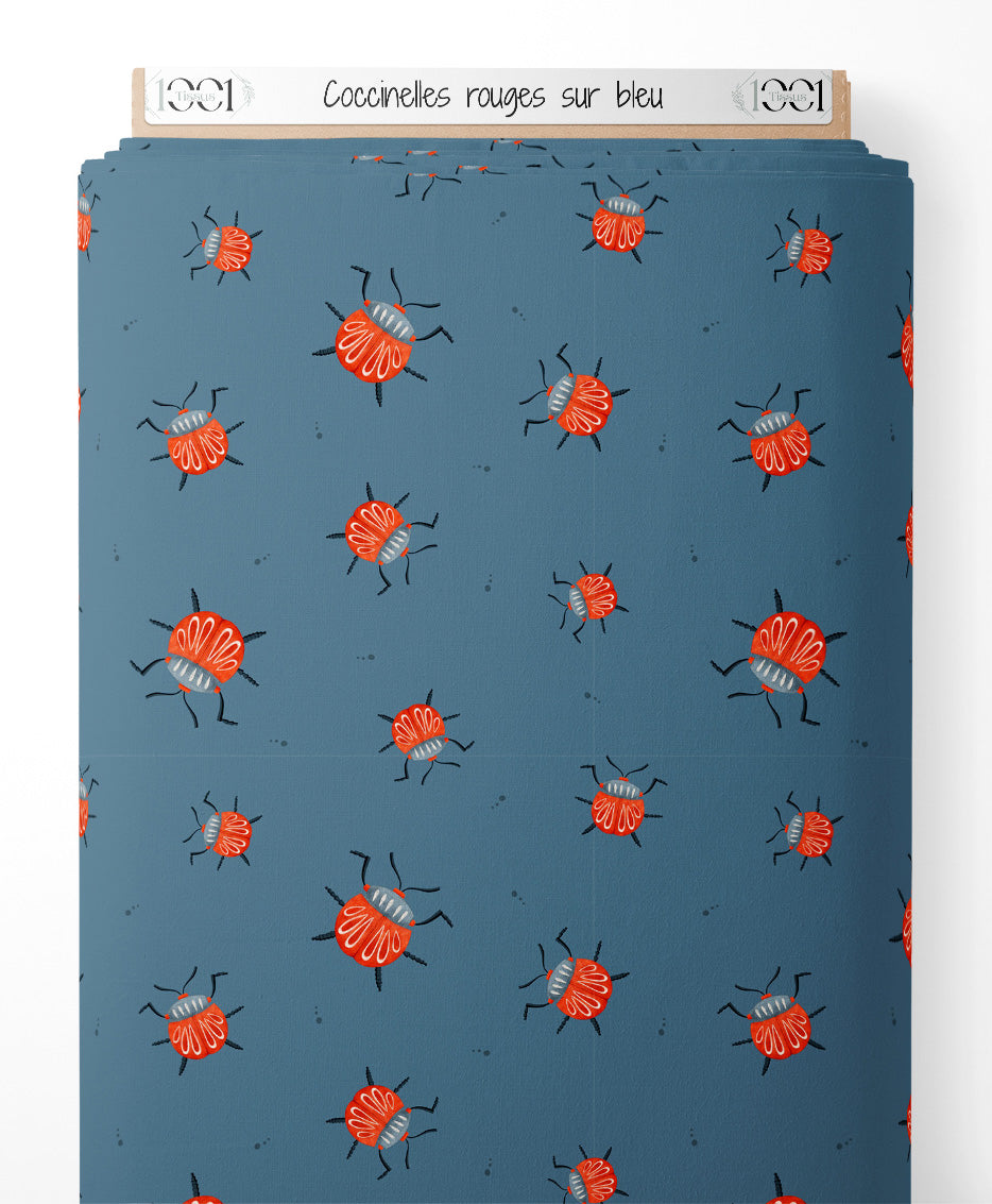 Tissu - Coccinelles rouges sur bleu