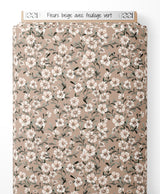 Tissu - Fleurs beige avec feuillage vert