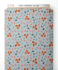 Tissu - Feuilles multicolores sur gris