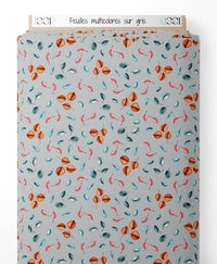 Tissu - Feuilles multicolores sur gris
