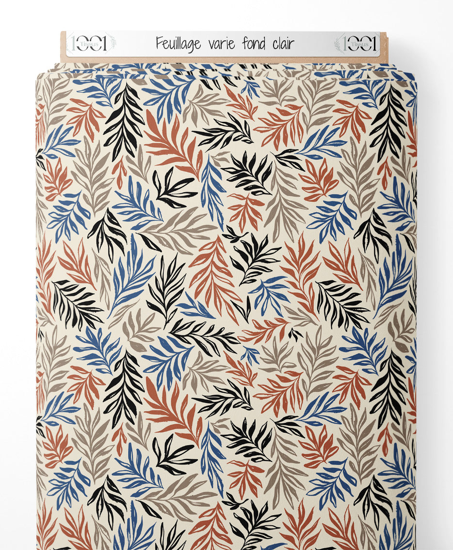 Tissu - Feuillage varié sur fond clair