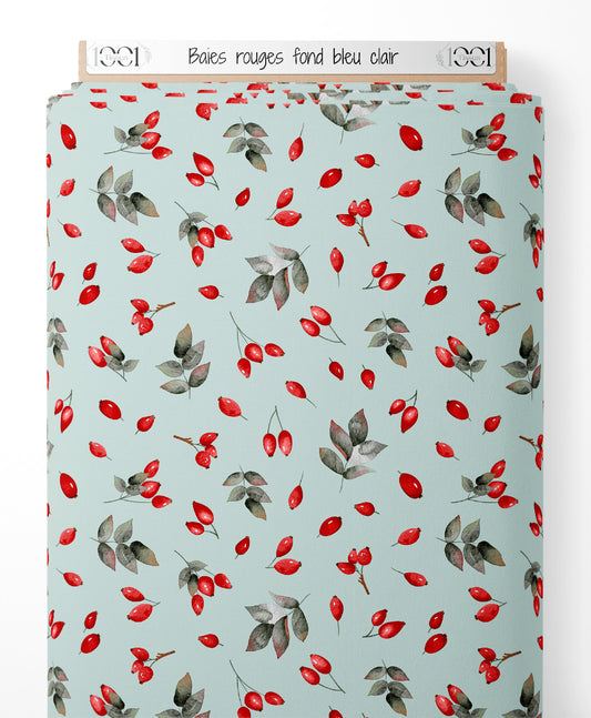 Tissu - Baies rouges sur fond bleu clair
