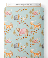 Tissu - Animaux en pulls sur fond bleu