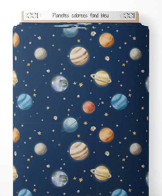Tissu - Planètes colorées sur fond bleu