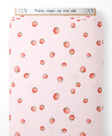 Tissu - Fraises rouges sur rose clair