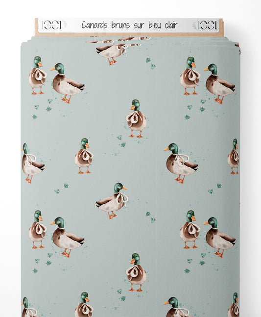 Tissu - Canards bruns sur bleu clair
