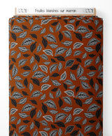 Tissu - Feuilles blanches sur marron