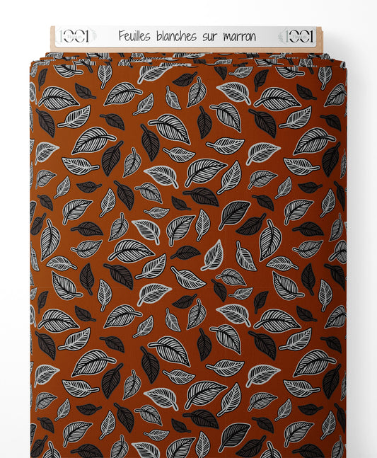 Tissu - Feuilles blanches sur marron