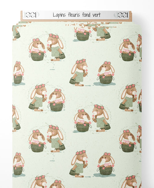 Tissu - Lapins fleuris sur fond vert