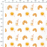 Tissu - Croissants et œufs souriants