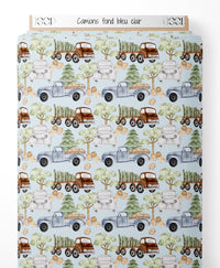 Tissu - Camions sur fond bleu clair