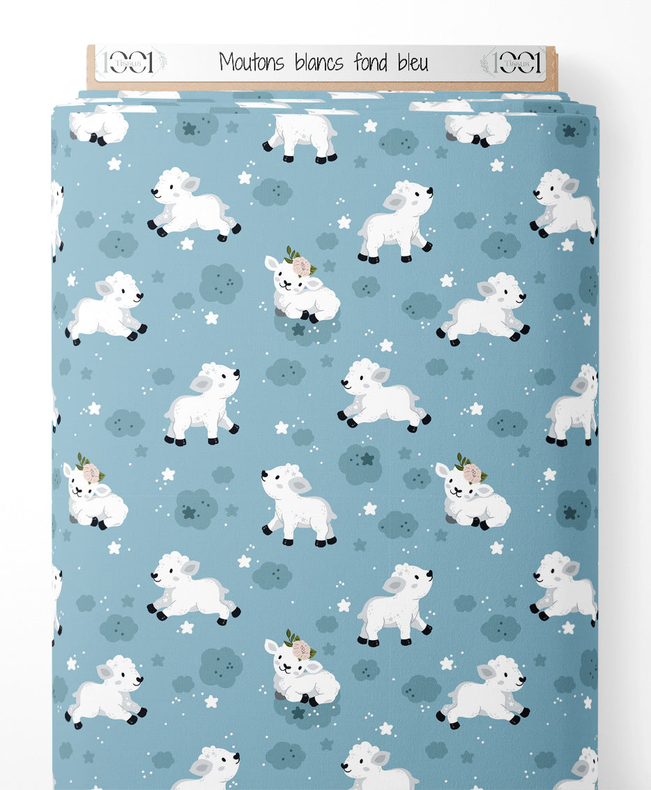 Tissu - Moutons blancs sur fond bleu