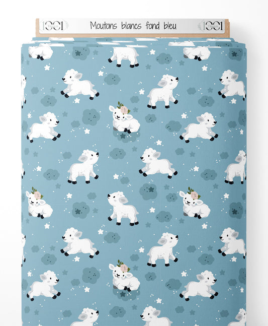 Tissu - Moutons blancs sur fond bleu